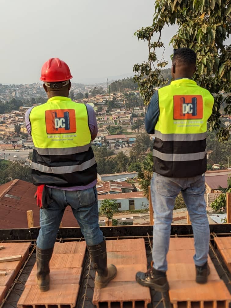 HDCG crew on an elevated slab overlooking Kigali
